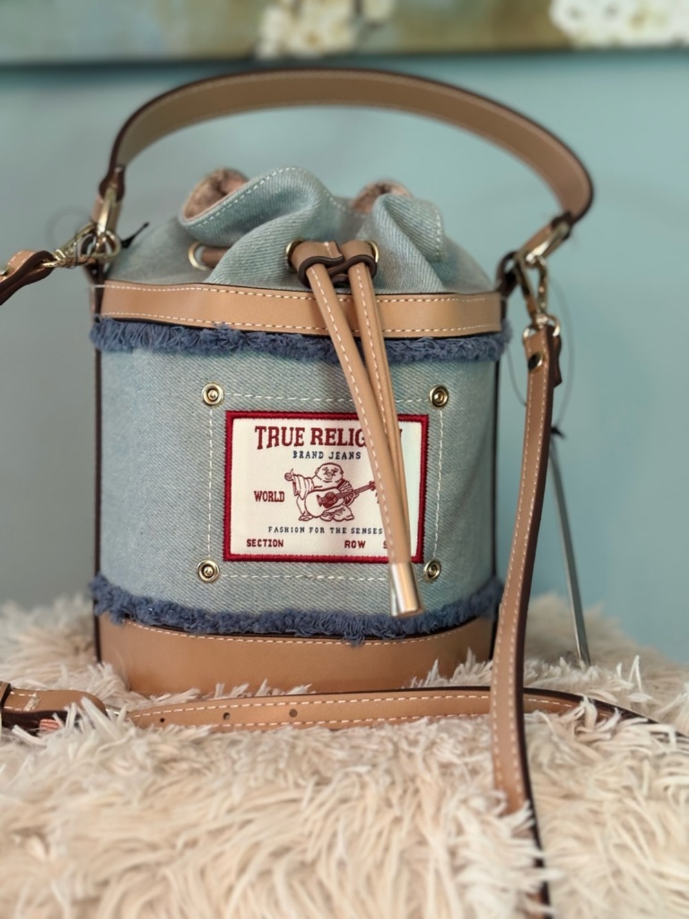 True Religion Light Blue Denim and Tan Leather Bucket Crossbody Bag